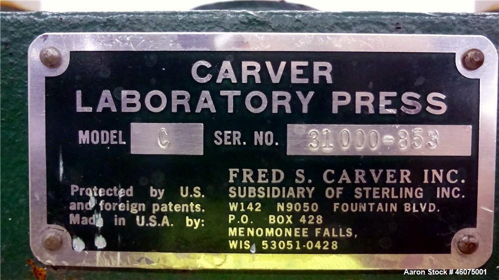 Used Carver Manual (2) Column Hydraulic Laboratory Press, 12 Ton Clamping Force, Model C. (2) 6" Wide x 6" long electrically heated platens, (2) 6" wide x 6" long water cooled platens. Maximum temper...