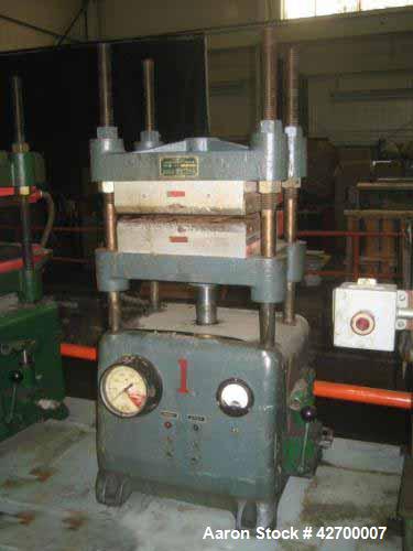 Used 30 Ton Carver Heated Platen Lab Press, Model W. Hydraulic 4 post upstroke type. Table model. Distance between 1.25" diameter posts: 13.5" left-right x 7.5" front-back. Platen area (nominal): 13"...