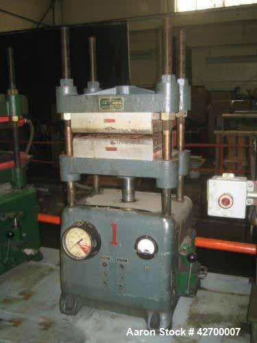 Used- 30 Ton Carver Heated Platen Lab Press, Model W. Hydraulic 4 post upstroke type. Table model. Distance between 1.25" di...