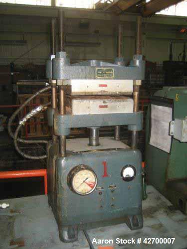 Used 30 Ton Carver Heated Platen Lab Press, Model W. Hydraulic 4 post upstroke type. Table model. Distance between 1.25" diameter posts: 13.5" left-right x 7.5" front-back. Platen area (nominal): 13"...
