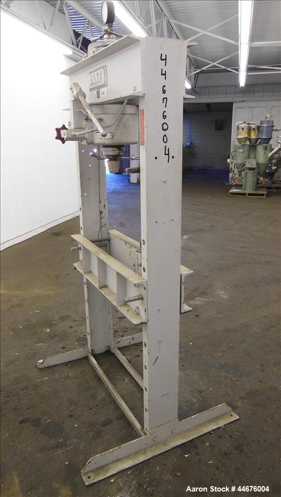 Used Dake Hand Operated Hydraulic Press, 50 Tons, Model 50H. Width between uprights 32-3/4", ram travel 4", screw travel 7".