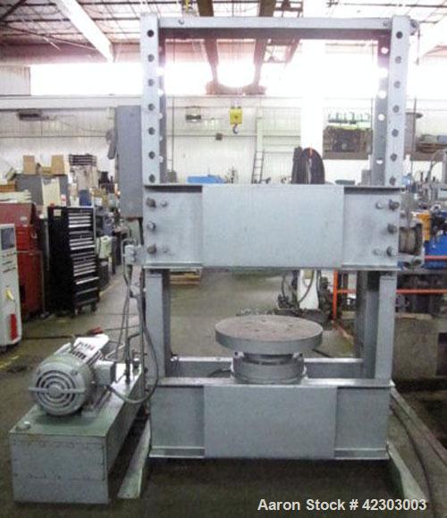 Used Dake Hydraulic H-Frame Tire Press, 150 Ton, Model 33-179. Upacting type, floor standing. Distance between side frames 48" L-R, distance between bed channels 12" F-B, distance over bed channels 2...