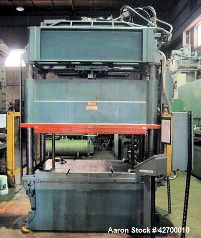 Used- 75 Ton Dake Hydraulic Press. 4 post downstroke type. Floor standing. Distance between 4" diameter posts 63" L-R x 32" ...