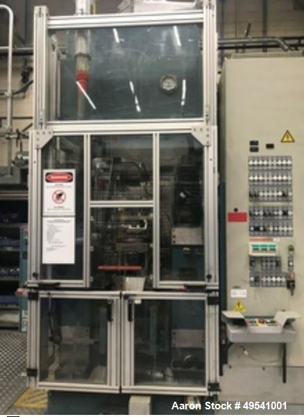 Used Dorst Hydraulic Press, Model TPA 100, 100-ton press. Reportedly rebuilt by Dorst to CE norm with a PQC in Year 2002. Year 1987.