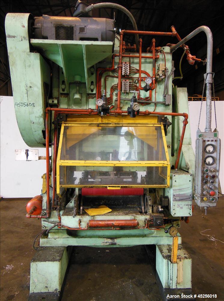 Used  Minster 60 Ton Straight Side Press, Model # P2-60. 60 ton capacity, Press bed area 36" X 25", Stroke of slide - 2", Adjustment of slide - 3", Shut height - 14", Scrap chute opening 16" X 7", St...