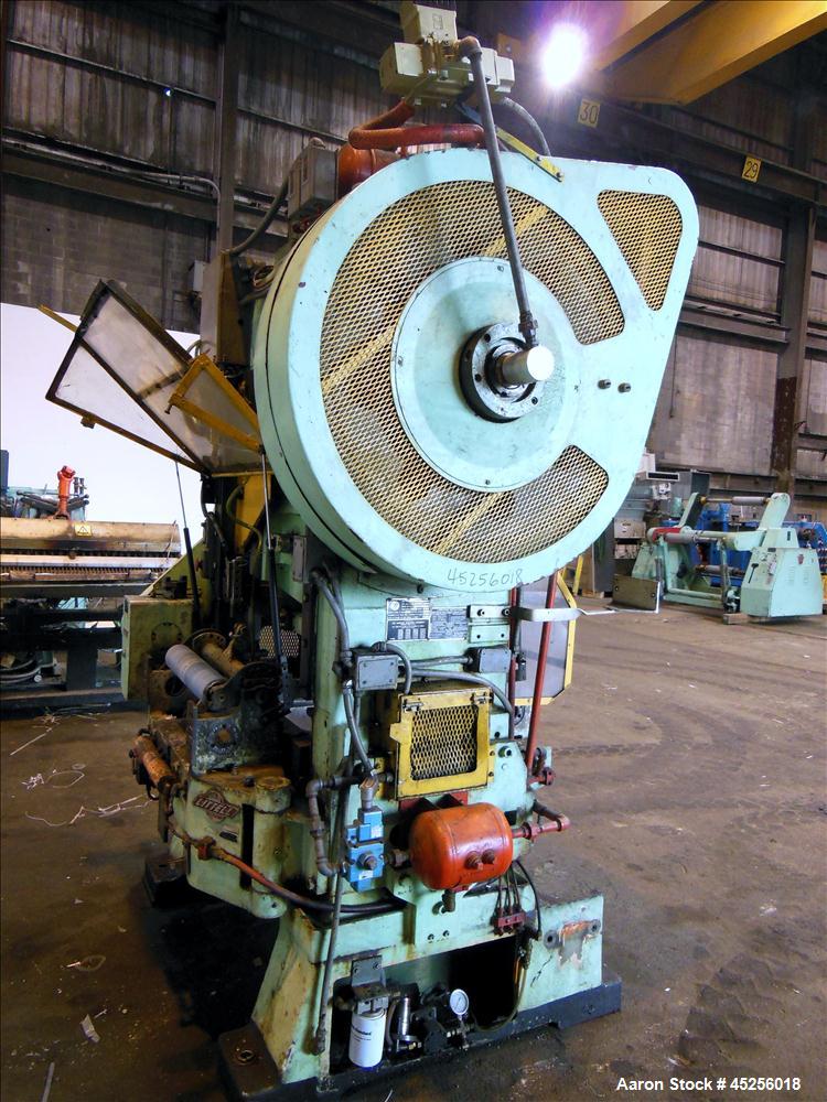 Used  Minster 60 Ton Straight Side Press, Model # P2-60. 60 ton capacity, Press bed area 36" X 25", Stroke of slide - 2", Adjustment of slide - 3", Shut height - 14", Scrap chute opening 16" X 7", St...