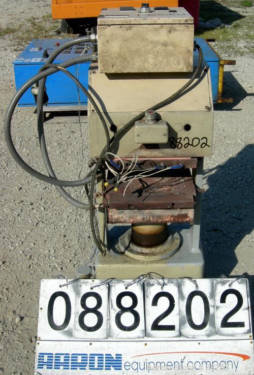 USED: PHI manual compression press, approximate 50 ton. Up acting cylinder. 12-1/2" x 12-1/2" electrically heated platens. Approximate 6" to 10" adjustable daylight. 0-6" stroke. Includes control pan...