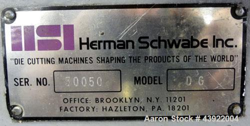 Used Schwabe 35 Ton Hydraulic Die Cutting Press With Shuttle Table, Model DG. Floor standing. Ideal press for cutting paper, cardboard, leather, rubber, plastics or textiles.  Distance between side f...