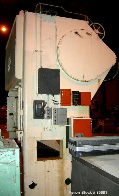 USED: Verson 100 ton straight side press, model 100-S2-84. Mechanically operated. 5" Adjustment. 18" Shut height. Platen 84" left to right, 32" front to back. (2) Side windows 20" x 14". 8" stroke of...