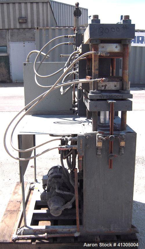 Used Wabash 50 Ton Upstroke Hydraulic Compression Press, model 50-1512-2T2WSM. (2) Electrically heated, water cooled platens 12'' x 15''. (2) 1 3/4'' diameter tie rods, distance between 18 3/4" left ...