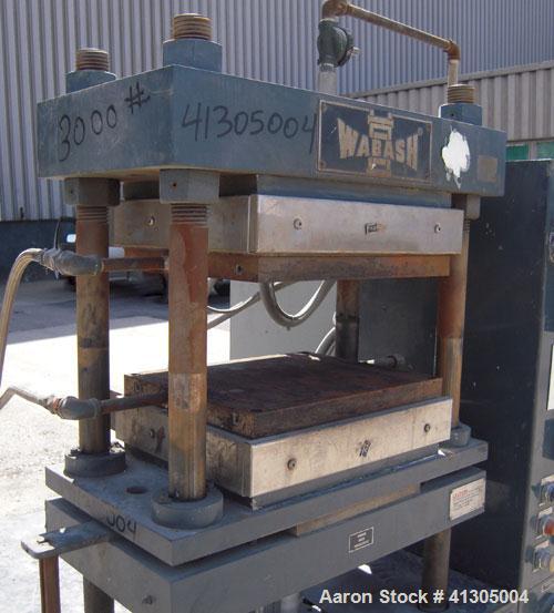Used Wabash 50 Ton Upstroke Hydraulic Compression Press, model 50-1512-2T2WSM. (2) Electrically heated, water cooled platens 12'' x 15''. (2) 1 3/4'' diameter tie rods, distance between 18 3/4" left ...