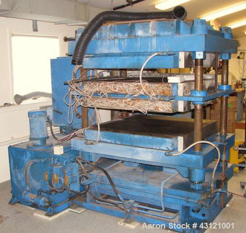 Used Wabash 50 Ton Molding and Laminating Press, Model 50-4040-4CTMX. 40" x 40" Electrically heated platens to 600 degrees F. Daylight opening between hot plates 6"-7". (3) 40" x 40" x 1" thick water...