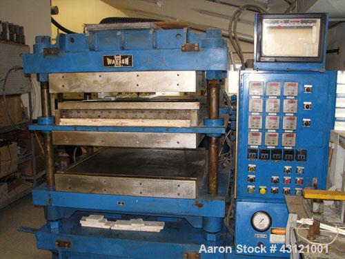 Used Wabash 50 Ton Molding and Laminating Press, Model 50-4040-4CTMX. 40" x 40" Electrically heated platens to 600 degrees F. Daylight opening between hot plates 6"-7". (3) 40" x 40" x 1" thick water...