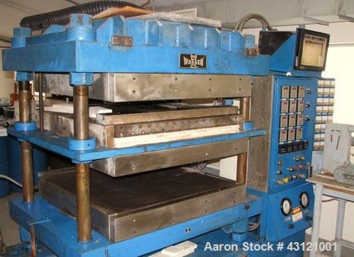 Used Wabash 50 Ton Molding and Laminating Press, Model 50-4040-4CTMX. 40" x 40" Electrically heated platens to 600 degrees F. Daylight opening between hot plates 6"-7". (3) 40" x 40" x 1" thick water...