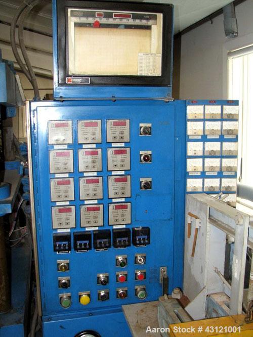 Used Wabash 50 Ton Molding and Laminating Press, Model 50-4040-4CTMX. 40" x 40" Electrically heated platens to 600 degrees F. Daylight opening between hot plates 6"-7". (3) 40" x 40" x 1" thick water...