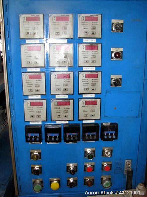 Used Wabash 50 Ton Molding and Laminating Press, Model 50-4040-4CTMX. 40" x 40" Electrically heated platens to 600 degrees F. Daylight opening between hot plates 6"-7". (3) 40" x 40" x 1" thick water...