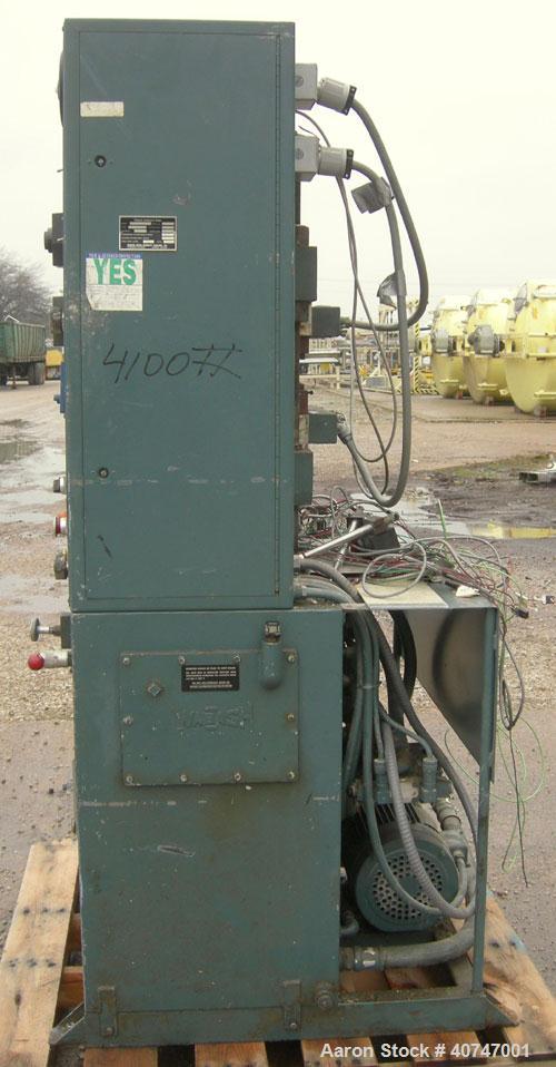 Used Wabash 75 Ton Hydraulic Press, model 75-18-2TMAC. Platen size 18" x 18".  Adjustable daylight opening 6-15".  7" stroke, 2" diameter tie rods, 463 psi maximum pressure on platens.  Electrically ...