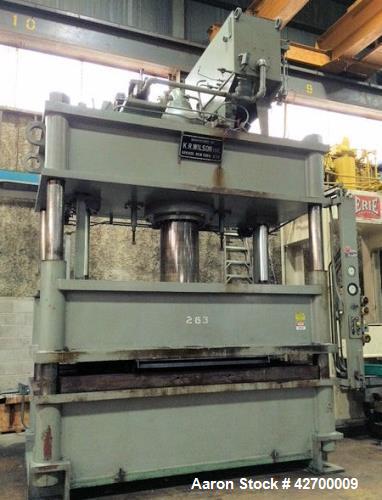 Used 600 Ton KR Wilson Hydraulic Press. 4 post downstroke type. Floor standing. Distance between 7" diameter posts 120" L-R x 47.5" F-B. Area of bed (nominal) 120" L-R x 66" F-B. Overall dimension of...