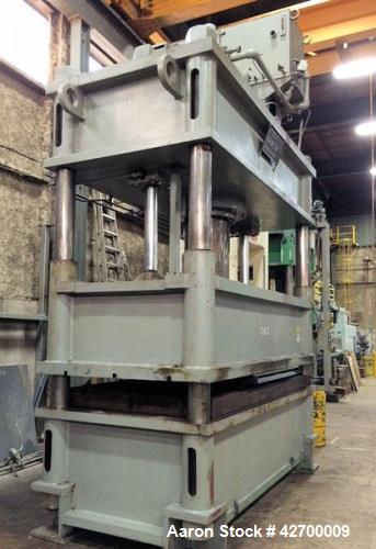 Used 600 Ton KR Wilson Hydraulic Press. 4 post downstroke type. Floor standing. Distance between 7" diameter posts 120" L-R x 47.5" F-B. Area of bed (nominal) 120" L-R x 66" F-B. Overall dimension of...