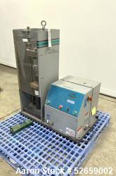 Used-Carver Heated Four Post Manual Hydraulic Press, Model 3888.1D10A00  15 Ton Capacity. Platens: 12" x 12", with one tempe...