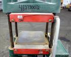 Used Carver Laboratory Manual Press, Model 2699, 30 Ton Clamping Force. Hydraulic, 4 post upstroke type. (2) 12