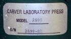 Used Carver Laboratory Manual Press, Model 2699, 30 Ton Clamping Force. Hydraulic, 4 post upstroke type. (2) 12