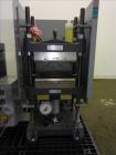 Used- Carver Heated Four Post Manual Hydraulic Press, Model 12-12H (4122), 12 To