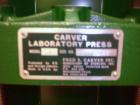 Used Carver Press, Model C, 15 ton compression pressure, with hydraulic pump with 1/2 hp 90 volt motor, pump serial #2822-324, press serial #31000-998.