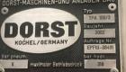 Used Dorst Hydraulic Press, Model TPA 100, 100-ton press. Reportedly rebuilt by Dorst to CE norm with a PQC in Year 2002. Year 1987.