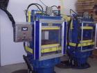 USED: French Oil slab side compression molding machine. With PLC controls, 4 station hydraulic manifolds. Three zone electric heated platens 24 x 24. (1) 4 circuit power pack, 30 hp motors/29 gpm pre...