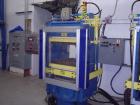 USED: French Oil slab side compression molding machine. With PLC controls 4 station hydraulic manifolds. Three zone electric heated platens 24 x 24. (1) 4 circuit power pack, 30 hp motors/29 gpm pres...