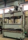 Used 600 Ton KR Wilson Hydraulic Press. 4 post downstroke type. Floor standing. Distance between 7