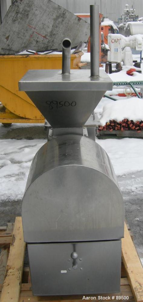 USED: Brown International extractor finisher, model 2200, 304 stainless steel. Approximate 5" diameter x 16" long plastic screw. 304 stainless steel screen area. Driven by an approximate 2 hp motor. ...