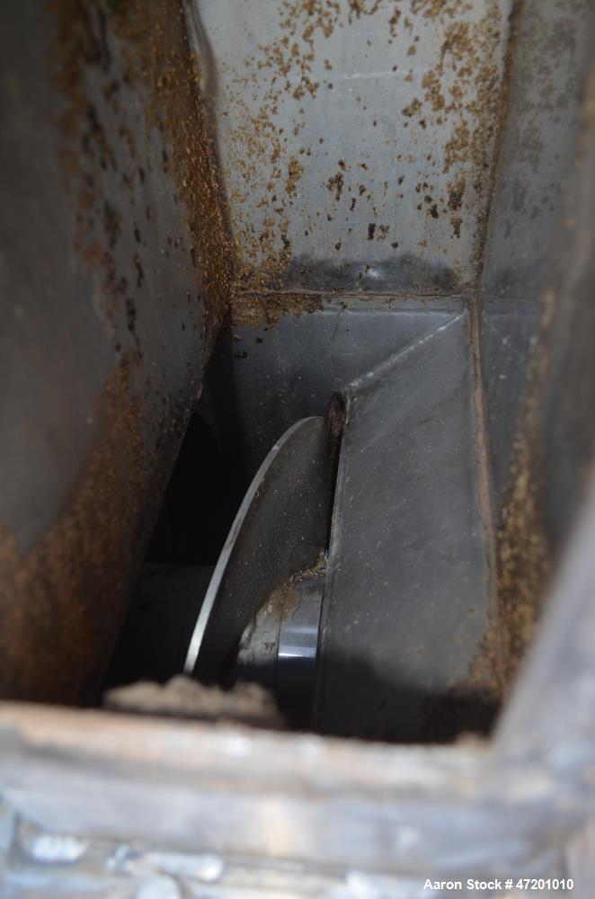 Used Brown International Extractor Finisher De-Watering Separator, Model 2503, Stainless Steel. Input capacity up to 200 gallons per minute depending on product. Approximate 12" diameter x 38" long s...