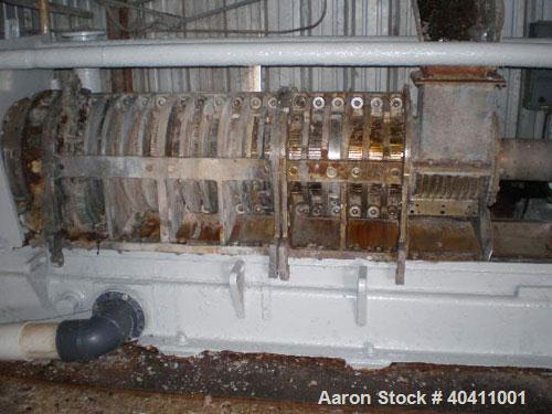 Used French Oil Mill Machinery 14" Dewatering Press, model N-110-12-MPC. Includes N series gearbox; short frame; (2) H-2-14" gearboxes with frame; new, unmilled piece of shaft material 17-4 PH anneal...