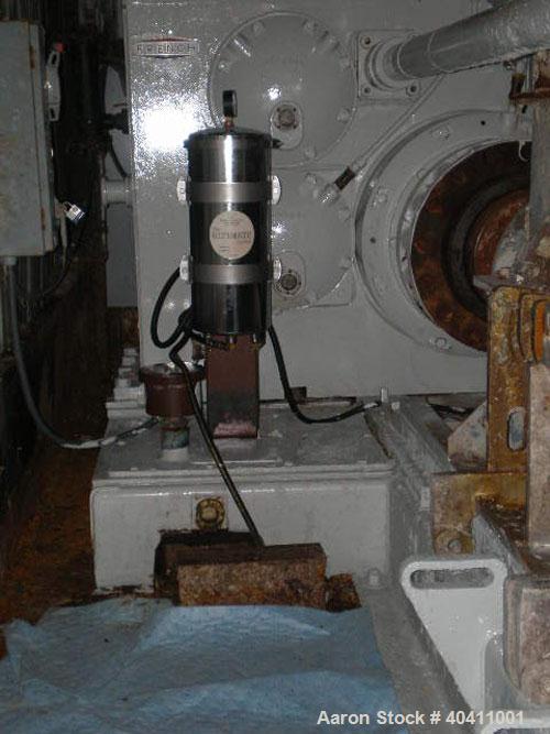 Used French Oil Mill Machinery 14" Dewatering Press, model N-110-12-MPC. Includes N series gearbox; short frame; (2) H-2-14" gearboxes with frame; new, unmilled piece of shaft material 17-4 PH anneal...