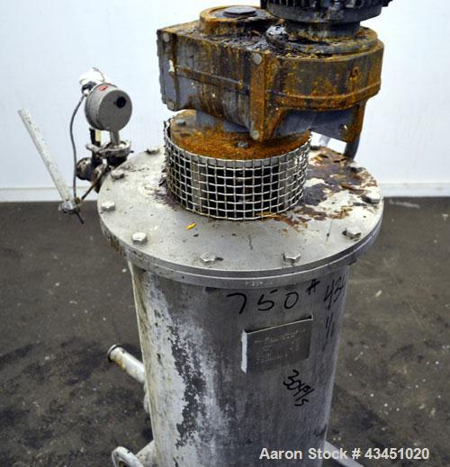 Used Hammerum Tullebolle Screw Press, 135 Liter (35.6 Gallon), 304 Stainless Steel Housing approximate 18" diameter x 36" straight side. Flat bolt on top and bottom. Internal rated 4 bar (58 psi) at ...