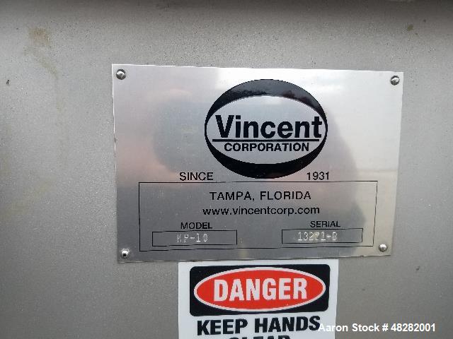 Used Vincent Horizontal Screw Press, Model KP-10. Approximate 10" diameter x 41" long screw. Approximate capacity GPM 10-100. 12" x 12" top feed. Press driven by a 10hp, 3/60/230/460 volt, 1750 rpm g...