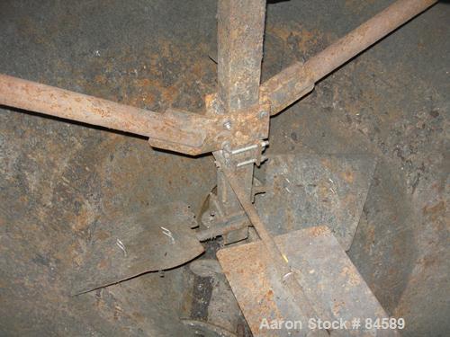 Used Pondorf Screw Press, 304 Stainless Steel. Approximate 12" diameter x 48" long screw. Driven by a 7.5 HP, 3/60/460 Volt, 1680 RPM varispeed gearmotor. Includes a carbon steel feed tank with a con...