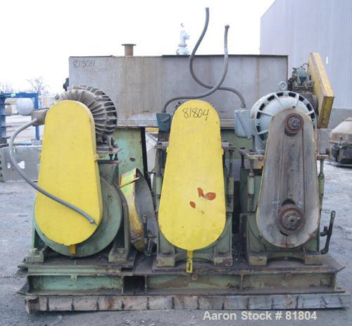 USED: Vetter Triple Screw Press, 316 stainless steel. (3) approximately 14" diameter x 6' long tapered screws, each driven by a 20 hp, 3/60/230/460 volt, 1750 rpm motor thru reducers, ratio 87:1. Top...