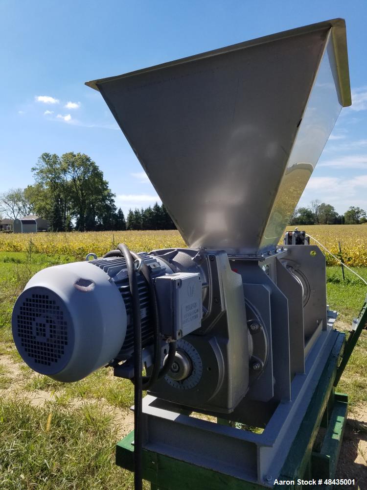 Used Vincent Screw Press, Model KP-10. 10" diameter. Continuous Horizontal. Stainless steel. 10 HP motor. Stainless steel shrouds.