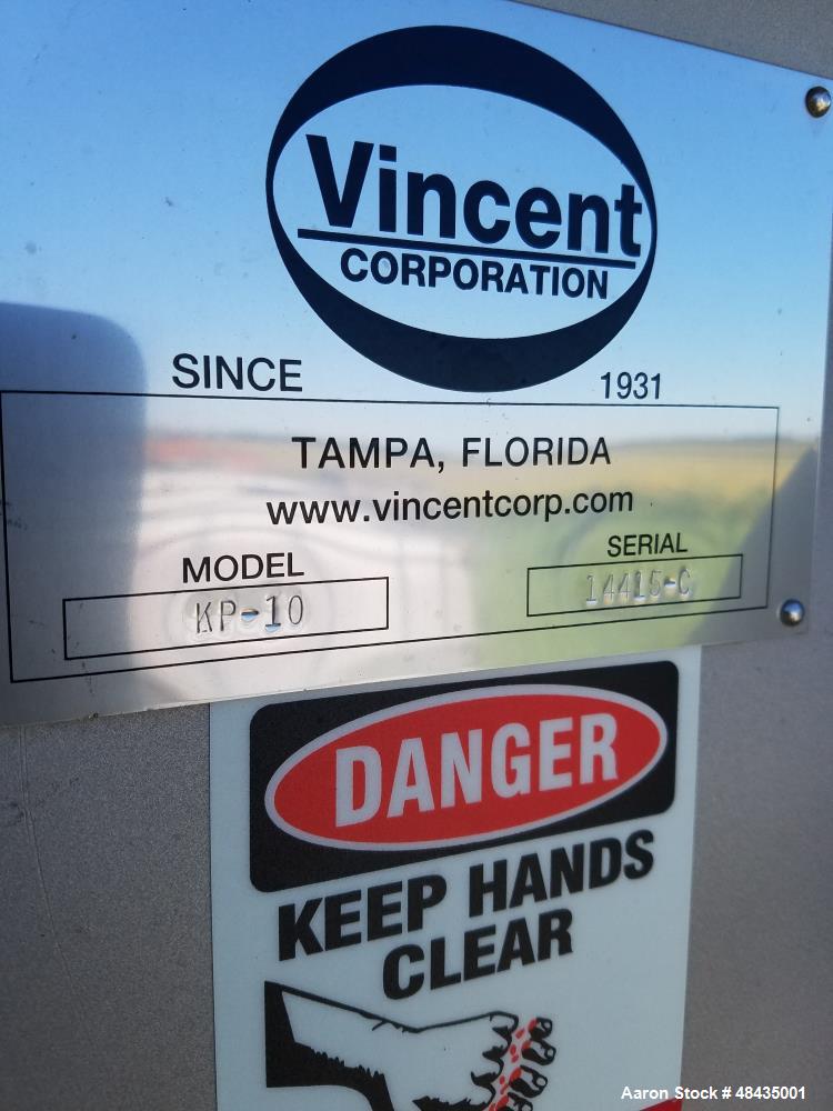 Used Vincent Screw Press, Model KP-10. 10" diameter. Continuous Horizontal. Stainless steel. 10 HP motor. Stainless steel shrouds.