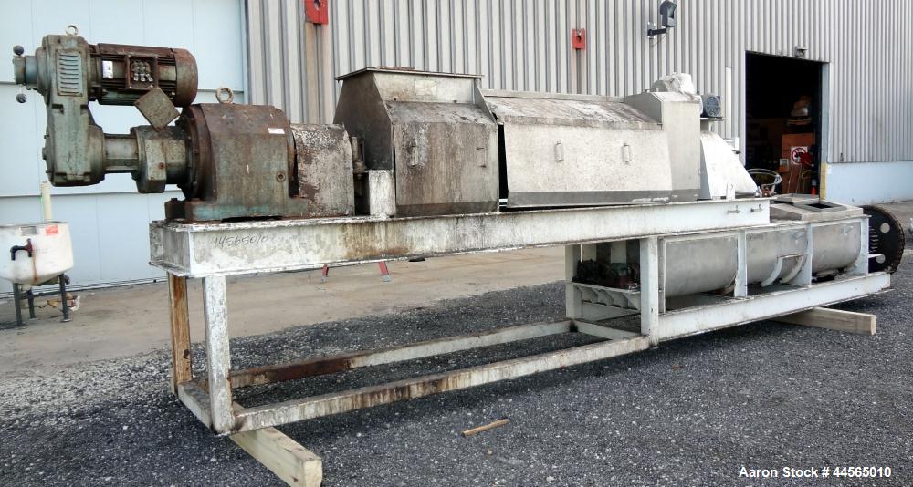 Used Vincent Horizontal Screw Press, Model VP16K2, 304 Stainless Steel. Approximate 16" diameter x 8" long screw, approximate capacity based on 55 pounds a cubic foot is 30,000 pounds an hour. Perfor...