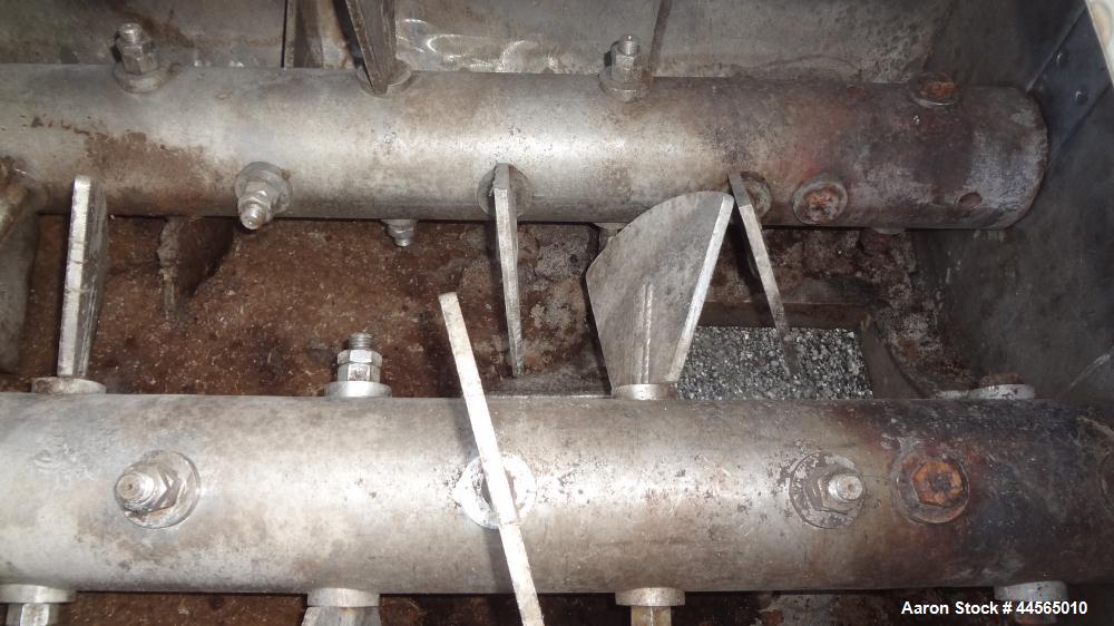 Used Vincent Horizontal Screw Press, Model VP16K2, 304 Stainless Steel. Approximate 16" diameter x 8" long screw, approximate capacity based on 55 pounds a cubic foot is 30,000 pounds an hour. Perfor...
