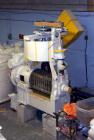 USED: Screw type oil expeller. Capacity: five tons of crushing per shift of eight hours. 25 hp motor with 8