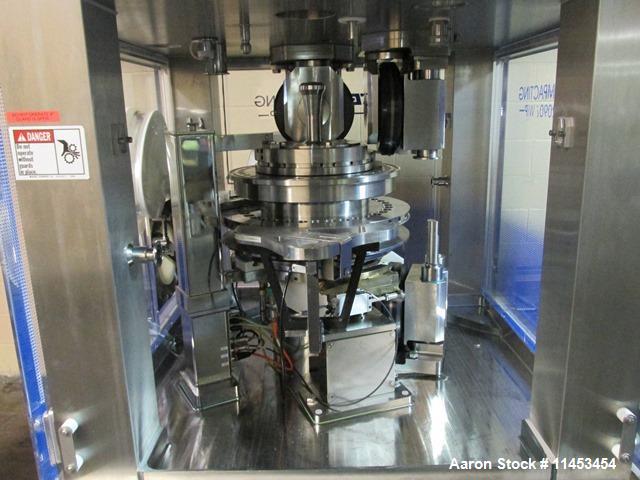 Used Used Fette 2090i WiP rotary tablet press, 36 station, 100 Kn pre-compression, 100 Kn main compression, single sided, keyed upper punch guides, 16 mm max tablet diameter, 18 mm max depth of fill,...