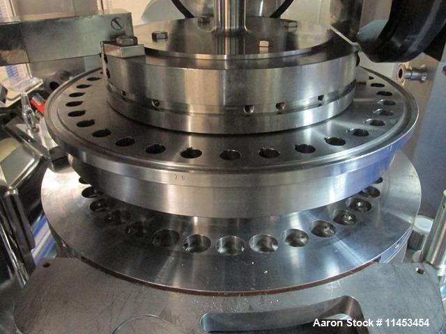 Used Used Fette 2090i WiP rotary tablet press, 36 station, 100 Kn pre-compression, 100 Kn main compression, single sided, keyed upper punch guides, 16 mm max tablet diameter, 18 mm max depth of fill,...