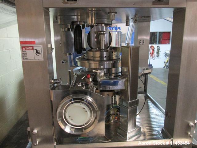 Used Used Fette 2090i WiP rotary tablet press, 36 station, 100 Kn pre-compression, 100 Kn main compression, single sided, keyed upper punch guides, 16 mm max tablet diameter, 18 mm max depth of fill,...