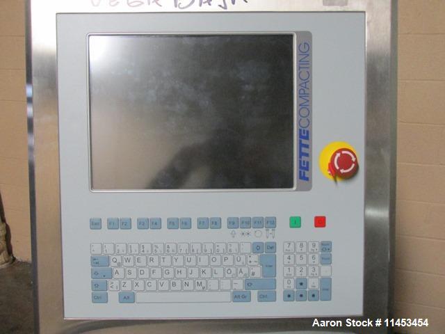 Used Used Fette 2090i WiP rotary tablet press, 36 station, 100 Kn pre-compression, 100 Kn main compression, single sided, keyed upper punch guides, 16 mm max tablet diameter, 18 mm max depth of fill,...