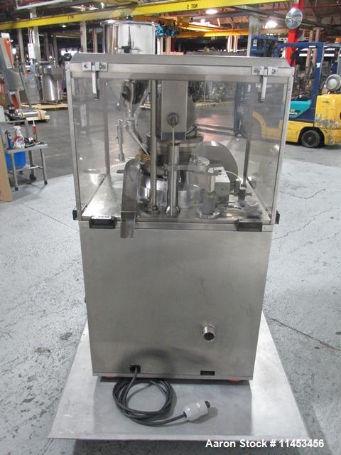 Used Used CPT (CapPlus Technologies) Econoline-M rotary tablet press, 16 stations, B tooled, keyed upper punch guide, feed hopper, 4 ton main compression pressure, rated up to 31,000 tablets/hr, seri...
